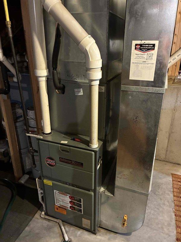 Performed air conditioning preventive maintenance on a 23-year-old R22 system at a recently purchased home with no prior maintenance history. Completed visual inspection of furnace components including heat exchanger, blower assembly, and associated systems; noted blower in deteriorated condition while heat exchanger and other components appeared satisfactory. Thoroughly cleaned heavily plugged condenser coil and inspected all AC components, which were found to be functioning adequately. Due to advanced system age, R22 refrigerant phase-out, overall equipment condition, and blower deterioration, recommended consideration of complete system replacement. All equipment currently operational at time of service completion.