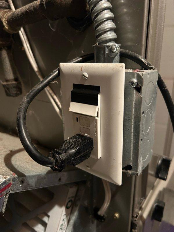 Responded to callback for furnace water leak following previous A/C repair. Diagnosed disconnected condensate pump discharge hose causing water to leak from unit bottom. Reattached condensate hose to proper connection point and verified proper drainage to sink with water test. Tested electrical circuit and condensate pump operation, confirming normal function with no additional issues found.