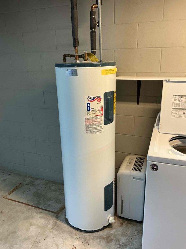 Responded to no cooling call with report of extremely loud compressor noise at vacant property. Upon arrival, system was off; started unit and observed normal operation with proper cooling and no unusual sounds. Performed complete system diagnostic including electrical component testing, which revealed capacitor testing below optimal specifications. Cleaned outdoor condenser coil and verified refrigerant charge within manufacturer specifications. Monitored system operation for 30 minutes with continued normal performance. Replaced weak capacitor as preventive measure. System restored to full cooling operation with normal sound levels.