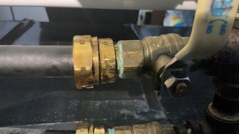 Responded to gas leak at fireplace gas line branch initially detected near furnace. Performed bubble test to isolate leak location, identifying failure at gas hose fitting connection to branch line. Attempted tightening of compression fitting, but upon removal discovered tear in hose at fitting interface. Removed defective gas hose, provided estimate for replacement, received customer approval, and successfully replaced damaged component. Verified integrity of new installation with leak test to ensure safe operation of gas system.