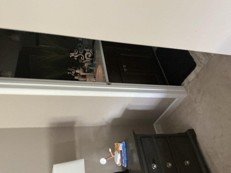 Responded to water leak at guest bathroom sink base and provided estimates for necessary plumbing repairs and upgrades. Assessed lavatory faucet requiring replacement, outdoor hose bibb needing installation, and water softener system requirements. Documented existing plumbing infrastructure including copper supply lines with shut-off valves and utility room configuration for future work authorization.