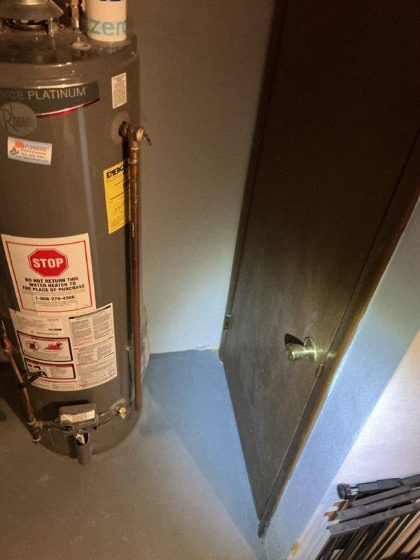 Relocated Rheem Platinum water heater approximately 4 inches to the right to provide adequate clearance for furnace filter access and replacement. Repositioned unit with all copper supply lines, fittings, and connections maintained in proper working order.