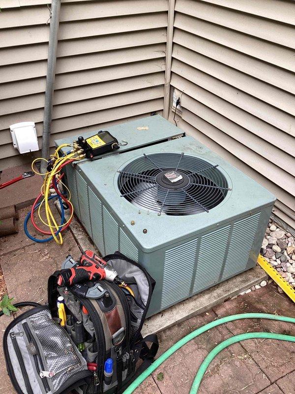 Responded to no cooling call on 15+ year old residential air conditioning system. Upon arrival, performed diagnostic evaluation and confirmed unit was low on refrigerant charge. Connected manifold gauges and service equipment to measure system pressures. System was operating with insufficient refrigerant levels, preventing adequate cooling capacity. Recharged system to proper specifications using appropriate refrigerant recovery and charging procedures. Due to age of equipment and current condition, provided estimate for complete system replacement as a long-term solution.