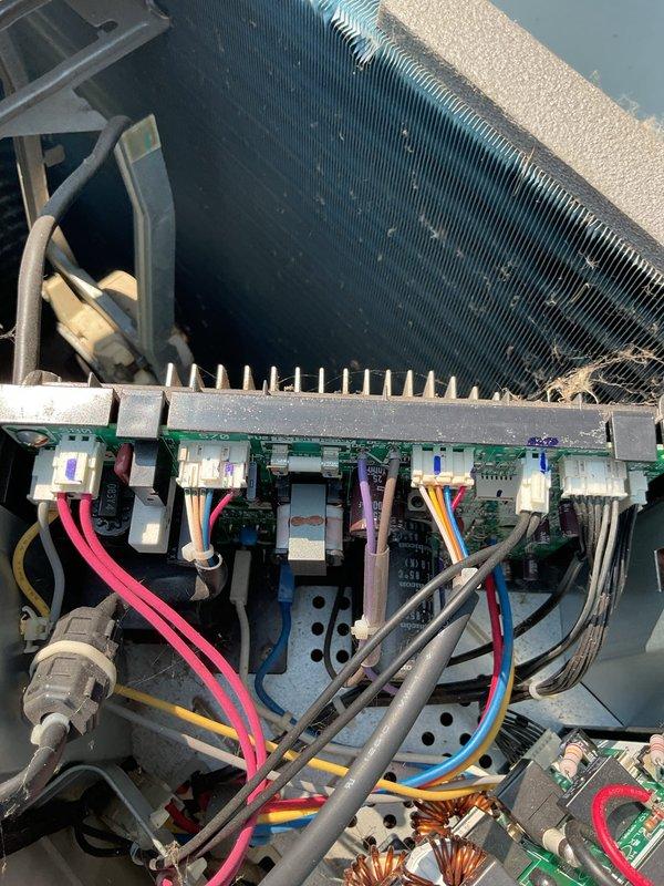 Responded to service call for upstairs Daikin mini-split system displaying "call service" error with flashing indicator light and no cooling. Upon inspection, diagnosed failed outdoor fan motor with inoperative outdoor unit. Inspected internal control board and heat sink assemblies, noting accumulated debris on evaporator coil fins. Determined replacement parts required: control board, outdoor fan motor, and fan blade. Submitted parts order for expedited delivery to restore system operation.