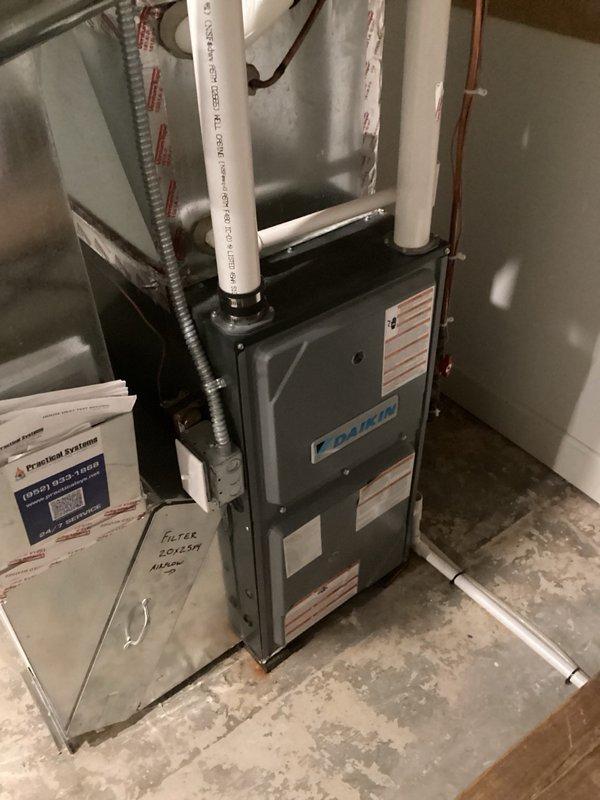 Completed annual spring tune-ups on three AC systems across multiple properties, including installation of customer-supplied furnace filters and verification that humidifiers were properly shut down for the cooling season. During inspection, discovered the middle condenser/furnace system in the larger mechanical room was significantly low on refrigerant charge, indicating an active leak; added 3 lbs of R410A refrigerant and injected leak detection dye to facilitate future leak location identification. All three systems are currently operating properly, with follow-up recommended once the system loses charge again to allow sufficient dye migration for effective leak detection and repair.