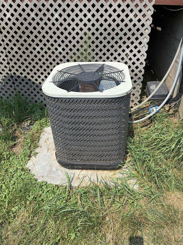 Responded to no cool complaint for commercial bar/dining room area served by Gibson split system and RTU. Found Gibson split system condenser heavily contaminated with grass clippings and debris from lawn maintenance activities. Disassembled and thoroughly cleaned condenser coil, inspected all components, and verified refrigerant charge with manifold gauges showing proper levels. Checked air filter, confirmed blower operation, and measured 19-degree temperature differential across evaporator coil indicating satisfactory performance. 

Performed preliminary inspection of RTU serving same space. Connected manifold gauges showing 230 psig high side and 70 psig low side pressures consistent with R22 refrigerant operation. Verified unit ran continuously with active condensate discharge throughout service visit. Inspected air filter finding acceptable condition and observed evaporator coil fully sweating indicating proper refrigerant flow. RTU condenser requires cleaning to maintain optimal 