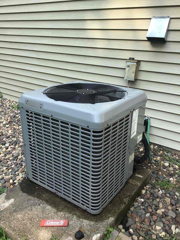 Responded to no cooling call with AC unit short cycling every three seconds. Diagnosed faulty pressure switch causing compressor damage, with compressor drawing excessive amperage up to 15 amps, exhibiting abnormal noise consistent with refrigerant leak, and visible oil accumulation at compressor plug. Due to extent of compressor damage, recommended system replacement over repair, and customer scheduled with advisor for full unit replacement.
