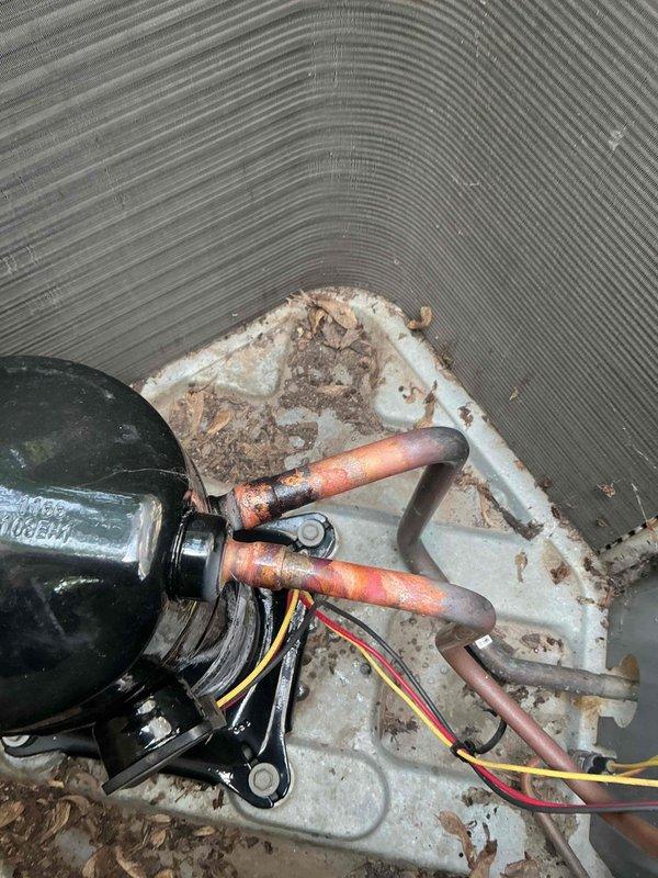 Responded to no cooling complaint on 6-year-old Lennox air conditioning system following recent compressor and evaporator coil replacement. Upon arrival, diagnosed system as low on refrigerant charge, indicating active leak in refrigeration circuit. Recharged system to manufacturer specifications and injected UV leak detection dye with sealant into refrigerant lines. Sealant may seal minor leak; scheduled follow-up leak search appointment in four weeks to verify system integrity and locate any remaining leaks if necessary.