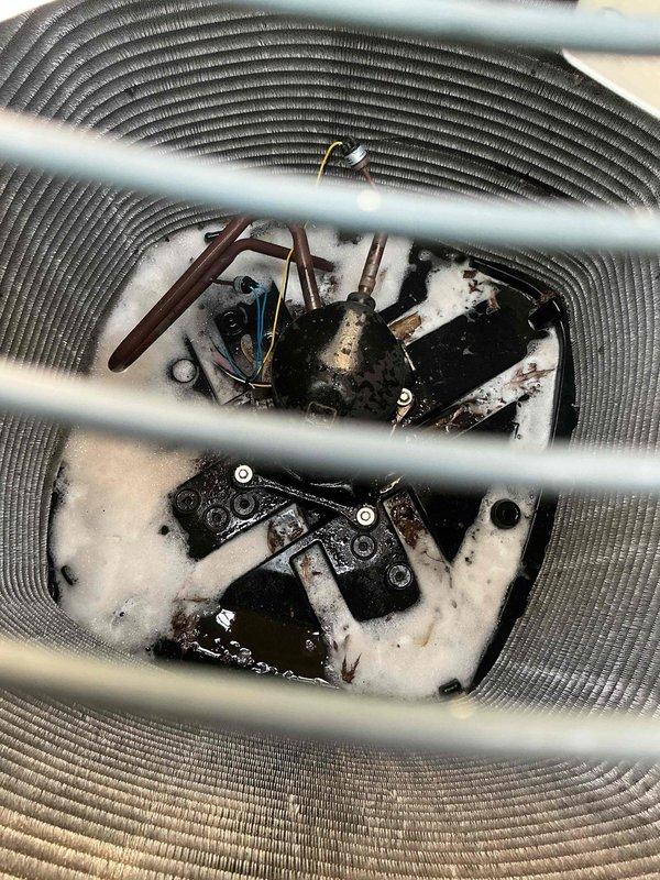 Responded to no cool call on 10+ year old system, one of two units in home. Upon arrival, unit was operational but showed evidence of previous freezing condition with ice buildup on evaporator coil and internal components. Performed comprehensive system inspection and deep cleaning of coil assembly to address restricted airflow that likely caused freeze-up. Verified proper refrigerant flow through copper lines, checked electrical connections, and confirmed fan operation. System restored to normal cooling operation with improved airflow after cleaning procedure.
