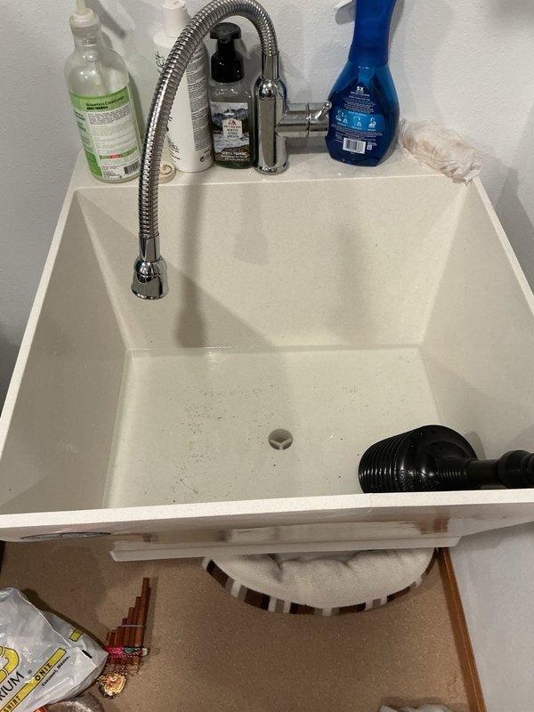 Responded to service call for clogged laundry room sink. Upon inspection, determined the blockage was located in the 4-inch main drain stack. Standard equipment was insufficient for clearing a drain of this diameter. Scheduled follow-up appointment for the next morning with appropriate larger capacity snake equipment to properly clear the 4-inch stack and restore drainage system functionality.