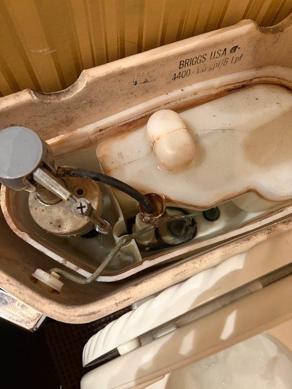 Responded to a toilet leak that required shutting off water to the home. Upon inspection, discovered the fill valve was not properly secured and the angle stop valve was not fully closed, both contributing to the continuous leak. Removed the defective fill valve and installed a new replacement unit, ensuring proper installation and secure connections. Verified angle stop was functioning correctly and fully closed. Tested the system to confirm the leak was eliminated and water supply restored to the home.