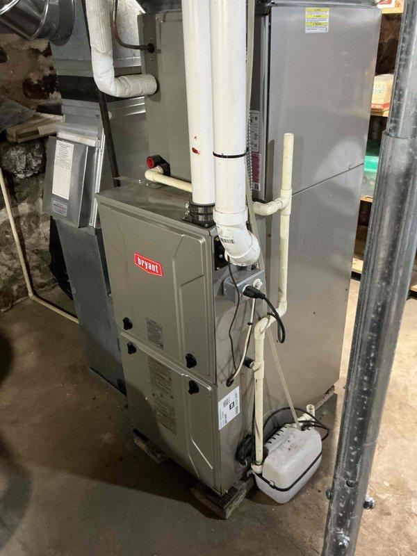 Completed annual air conditioning tune-up on 6-year-old residential system under maintenance agreement. Performed comprehensive inspection of all components including electrical connections, blower assembly, and evaporator coil which was found to be exceptionally clean. Verified air filter had been recently changed, confirmed blower speeds were properly configured, and tested system operation with satisfactory results showing 21-degree temperature differential across the coil.