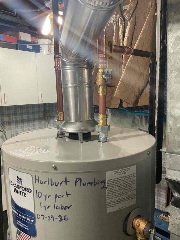 Responded to service call for leaking 40-gallon natural gas water heater. Upon inspection, identified active leak originating from bottom of tank on 2013 Rheem unit, indicating internal tank failure. Removed and properly disposed of failed water heater. Installed new Bradford White 40-gallon natural gas water heater with 10-year parts and 1-year labor warranty. Connected copper supply lines with brass fittings, installed proper venting system, and tested all connections for leaks. Verified proper gas combustion, temperature settings, and overall system operation before completing installation.