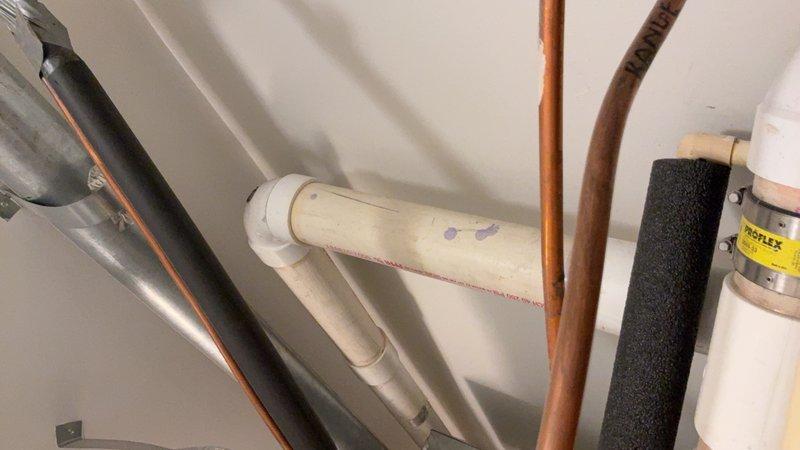 Conducted on-site evaluation for gas water heater replacement. Assessed existing tank-style water heater installation, including gas supply line with flexible yellow CSST connector, shut-off valve, and associated plumbing connections. Documented current system configuration with copper supply lines, PVC venting, and electrical components. Provided customer with comprehensive replacement options comparing traditional tank-style units versus tankless water heater systems, including necessary modifications to gas lines, venting requirements, and plumbing connections for each option.