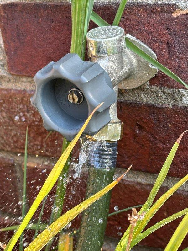 Responded to service call for leaking outdoor hose bibb mounted on exterior brick wall. Upon inspection, confirmed active water leak from the existing fixture. Removed the deteriorated hose bibb and installed new replacement unit with proper sealing to prevent future leaks. Tested new installation to verify proper water flow and confirmed no leakage at connection points.