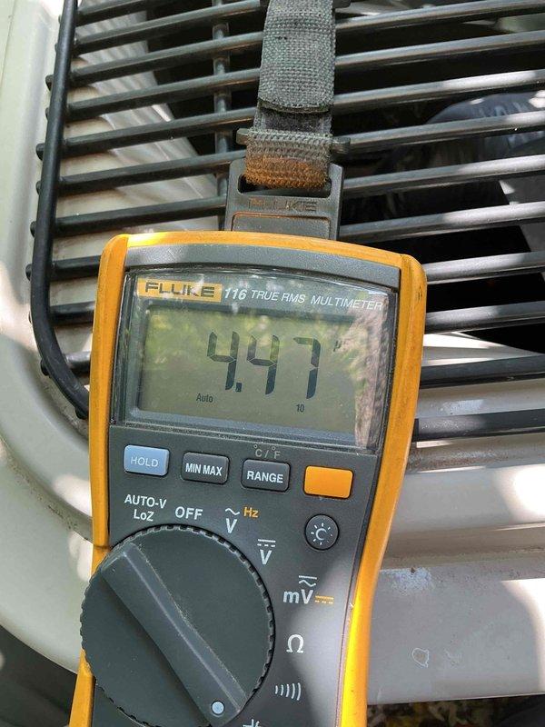 Responded to no cool call on 16-year-old Bryant air conditioning system. Diagnosed low refrigerant charge (410A), failed fan capacitor, and dirty condenser coil. Verified adequate airflow from air handler and confirmed filter was not restrictive. System currently maintaining acceptable temperatures with evaporator coil not yet reaching freezing point. Provided customer with repair options and scheduled follow-up service advisor appointment for system evaluation and recommendations.