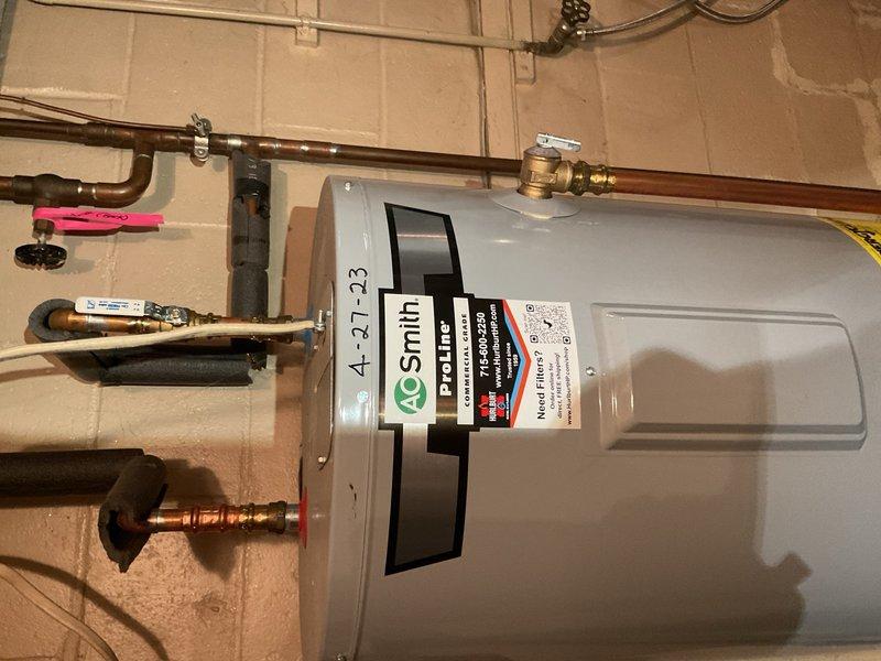 Responded to no cooling call on older Fedders Flexhermetic condensing unit with R-22 refrigerant. Unit was located under deck with approximately 3.5 ft clearance, creating restricted air discharge and recirculation issues. Upon inspection, found unit operating with severe abnormal noise and critically low refrigerant charge. Due to age of equipment, obsolete R-22 refrigerant, existing noise condition, low charge, and poor serviceability from restrictive installation location, repair was deemed not cost-effective. Recommended full condenser replacement with relocation to side of home to eliminate deck restriction and improve future serviceability. Homeowner approved recommendation and scheduled consultation with service advisor for equipment replacement and relocation.