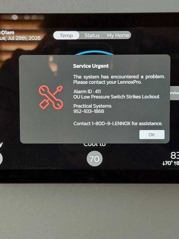 Responded to no cool complaint on Lennox system displaying lockout fault with Alarm ID 411 for outdoor unit low pressure switch strikes. Verified adequate indoor airflow and inspected air filter condition. Performed comprehensive visual inspection of evaporator coil, condenser coil, and compressor area for refrigerant leakage using UV dye detection method with no leak source identified during inspection. Checked refrigerant circuit and confirmed system operating with low refrigerant charge, indicating probable leak that is not visually detectable at this time. Temporarily restored system operation. Rescheduled for further diagnostics and leak detection to identify refrigerant loss source and complete repairs under warranty coverage.