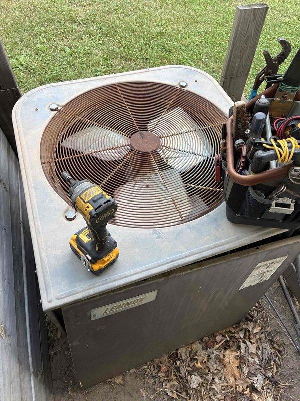 Responded to no cooling complaint on 1988 R-22 system with indoor temperature at 85°F. Found high pressure safety switch tripped due to heavily plugged condenser coil. Cleaned condenser coil thoroughly, reset high pressure switch, and installed customer-supplied air filter. Verified system operation with gauges showing normal operating pressures and 19° temperature differential across evaporator coil. Discussed system age, R-22 refrigerant phase-out implications, and recommended scheduling consultation for replacement options given the 30-year-old unit.