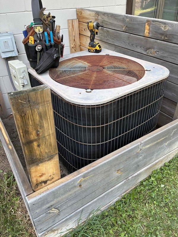 Responded to no cooling complaint on 1988 R-22 system with indoor temperature at 85°F. Found high pressure safety switch tripped due to heavily plugged condenser coil. Cleaned condenser coil thoroughly, reset high pressure switch, and installed customer-supplied air filter. Verified system operation with gauges showing normal operating pressures and 19° temperature differential across evaporator coil. Discussed system age, R-22 refrigerant phase-out implications, and recommended scheduling consultation for replacement options given the 30-year-old unit.