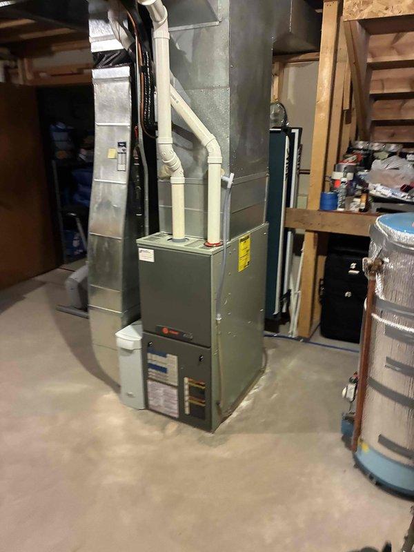 Completed promotional air conditioning preventive maintenance tune-up on residential split system. Performed comprehensive inspection of outdoor condenser unit and indoor furnace components, verifying all operational parameters were within manufacturer specifications. System tested and confirmed cooling properly with no deficiencies noted.