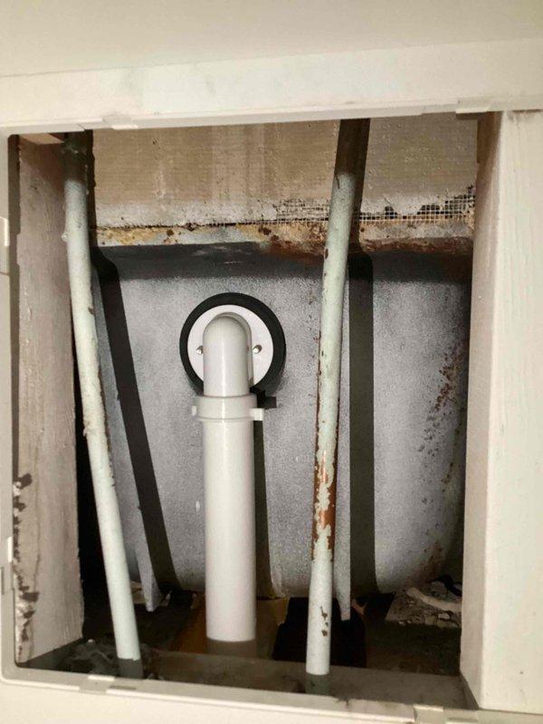 Responded to water leak complaint at rental property where bathtub was leaking during use. Upon inspection, discovered missing gasket on the overflow assembly. Accessed plumbing from below through basement/utility area, confirmed leak source at tub overflow connection, and installed replacement gasket to restore proper seal and eliminate water infiltration.