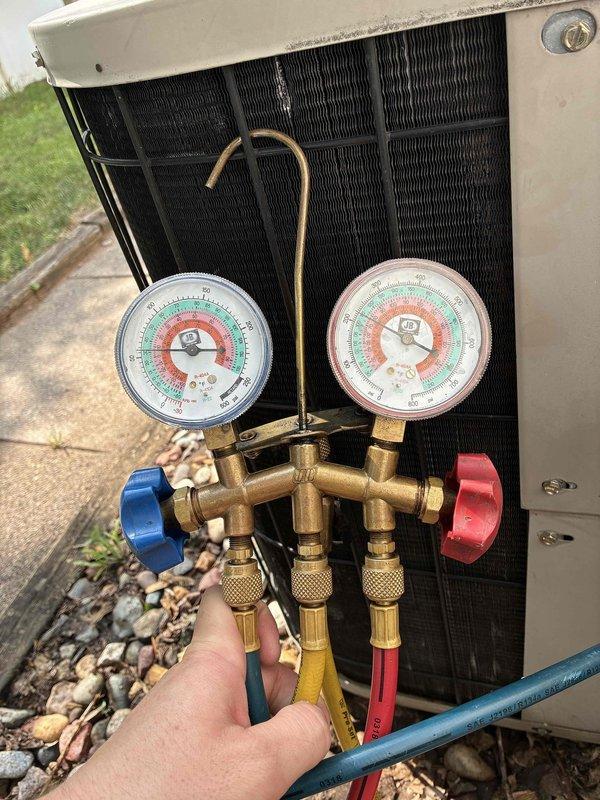 Responded to no cool callback on 10+ year old system following previous day's capacitor replacement. Upon arrival, found severely restricted airflow from outdoor unit due to plugged condenser coil that appeared clean on surface inspection. Performed thorough condenser coil cleaning, which restored proper airflow and improved system performance. Measured operating pressures before and after cleaning, noting slight pressure drop post-service. Temperature differential across evaporator coil improved from 15 degrees to 20 degrees, indicating enhanced cooling capacity. Advised customer that while system is now cooling significantly better, the unit's age and operating characteristics suggest potential for future reliability concerns.