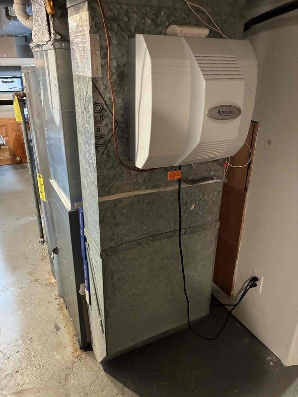 Responded to no cool callback on 10+ year old system following previous day's capacitor replacement. Upon arrival, found severely restricted airflow from outdoor unit due to plugged condenser coil that appeared clean on surface inspection. Performed thorough condenser coil cleaning, which restored proper airflow and improved system performance. Measured operating pressures before and after cleaning, noting slight pressure drop post-service. Temperature differential across evaporator coil improved from 15 degrees to 20 degrees, indicating enhanced cooling capacity. Advised customer that while system is now cooling significantly better, the unit's age and operating characteristics suggest potential for future reliability concerns.