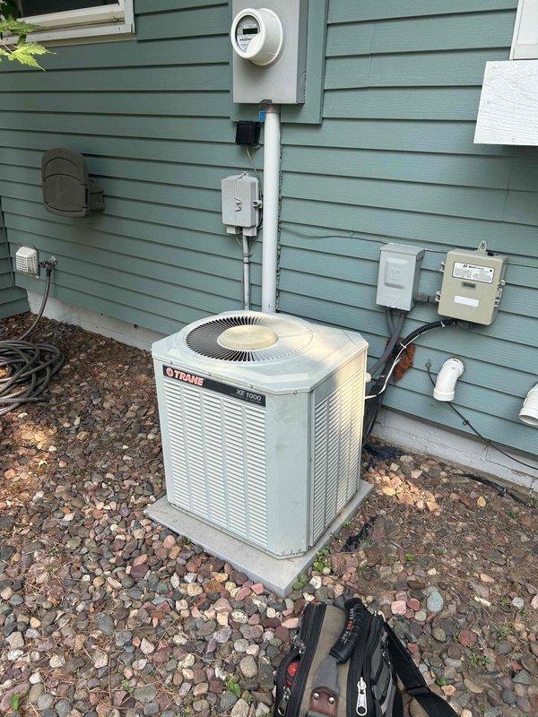 Completed comprehensive air conditioning tune-up on older Trane outdoor condensing unit and Trane XE 80 furnace system. Performed standard preventive maintenance procedures including inspection of all major components, electrical connections, refrigerant levels, and system operation. Unit found to be in good operating condition with no deficiencies noted or repairs required at this time.