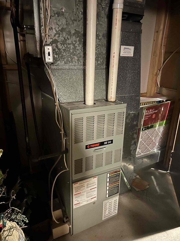 Completed comprehensive air conditioning tune-up on older Trane outdoor condensing unit and Trane XE 80 furnace system. Performed standard preventive maintenance procedures including inspection of all major components, electrical connections, refrigerant levels, and system operation. Unit found to be in good operating condition with no deficiencies noted or repairs required at this time.