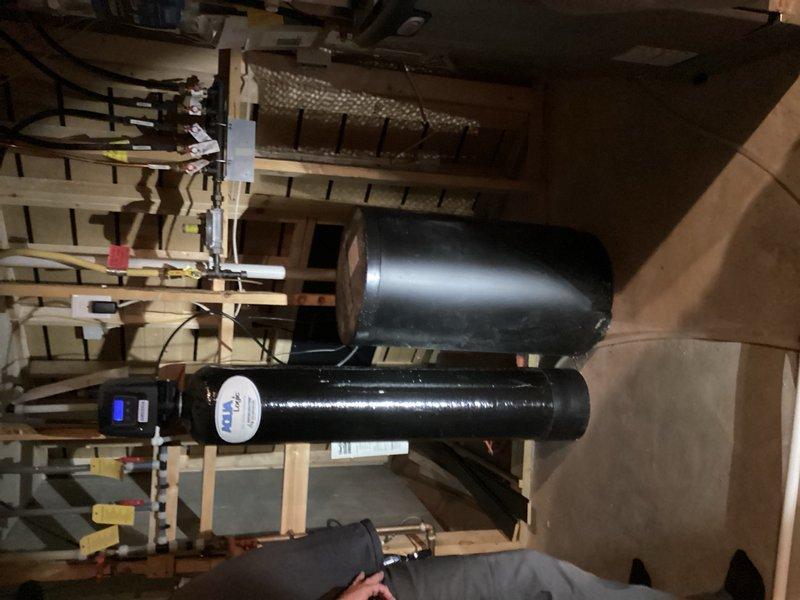 Responded to service call for non-functional sump pump and leaking tub spout. Diagnosed failed sump pump unit and defective Moen cartridge in bathtub fixture causing visible leak at shower/bath handle. Removed and replaced malfunctioning sump pump with new unit and installed replacement cartridge in tub spout assembly, restoring proper function to both plumbing systems.