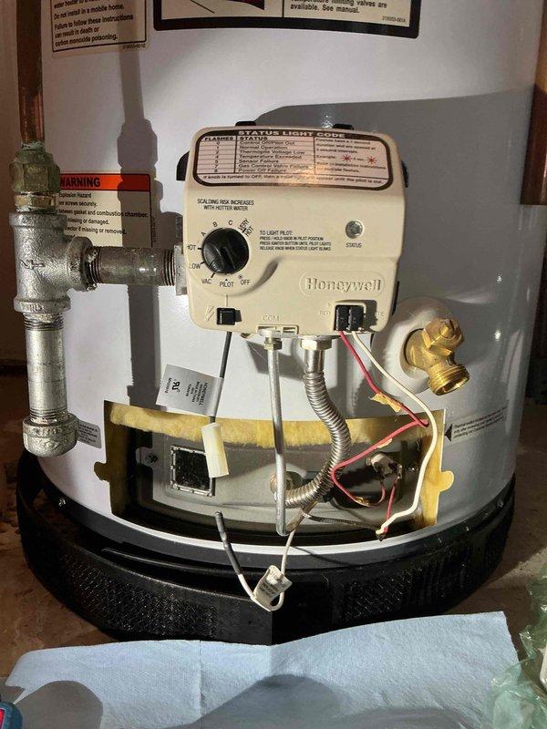 Replaced flammable vapor sensor and complete flame assembly on gas-fired water heater. Verified proper operation of all components following installation to ensure safe and reliable unit function.