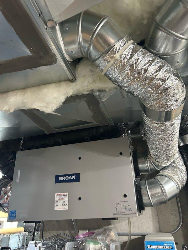 Responded to no cooling complaint on 5-year-old central air conditioning system. Performed comprehensive diagnostic including air filter inspection, thermostat verification, blower speed check, and outdoor unit examination. Identified failed dual-run capacitor (45+5 MFD) as root cause of system failure. Replaced defective capacitor with new unit, verified proper electrical connections, and confirmed refrigerant system pressures within normal operating range. System restored to full cooling operation.