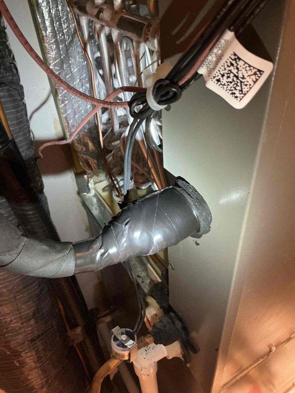 Responded to warranty callback on 2-year-old Lennox AC system with no cooling issue. Performed diagnostic testing and found refrigerant charge adequate with good subcooling, but low side pressure dropping to low 20s PSI and slowly creeping back up. Relocated TXV sensing bulb to horizontal suction line run and re-insulated to eliminate potential bulb positioning as cause. Pressure behavior indicated thermostatic expansion valve attempting to open but mechanically restricted or stuck. Determined TXV replacement required under warranty. Ordered replacement TXV for follow-up installation visit.