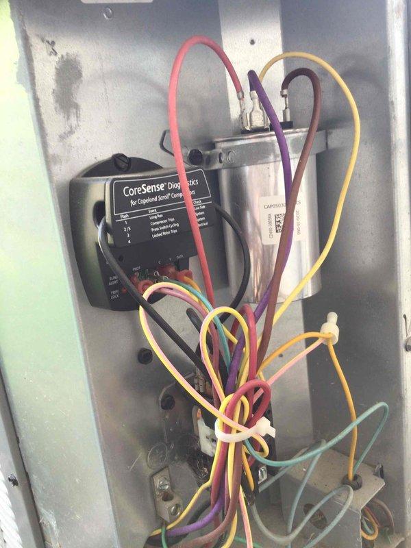 Responded to a no cooling complaint on a five-year-old air conditioning system. Diagnosed a failed hermetic terminal on the dual run capacitor, which prevented the compressor from operating properly. Replaced the defective capacitor, restored normal system operation, and verified proper cooling performance.