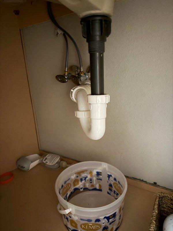 Completed return visit to install customer-supplied bathroom faucet. Removed existing faucet assembly and installed new fixture, connecting hot and cold water supply lines to shutoff valves using braided stainless steel flex lines. Installed drain assembly with pop-up mechanism and verified proper alignment with P-trap. Tested all connections for leaks, confirmed proper water flow and drainage, and ensured shutoff valves operated correctly.
