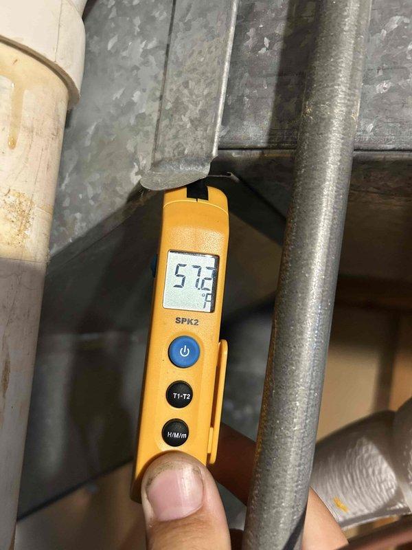 Responded to first call for AC system low on refrigerant. Added first pound of R410A refrigerant with proper level adjustment, replaced air filter, and injected UV dye solution into system for future leak detection. Verified system operation by running equipment through complete cycle, confirmed proper condensation drainage, and measured supply air temperature at 57.2°F and return air temperature at 73.5°F to ensure adequate cooling performance and proper system function.