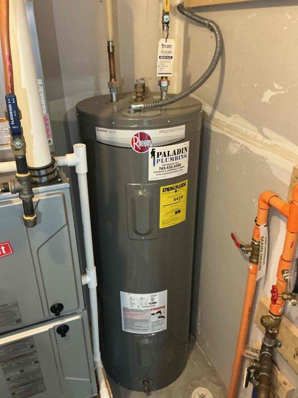Responded to dispatch for inadequate hot water supply from a 10-year-old gas water heater. Customer reported hot water lasting only 7-8 minutes during showers. Upon arrival, conducted diagnostic testing and measured output water temperature at 102°F after 56 minutes of continuous operation, confirming insufficient heating capacity. Determined that the existing gas unit required replacement due to failed heating components and age-related deterioration. Removed old gas water heater and installed new Rheem residential tank water heater with proper venting, supply lines, and code-compliant connections including PEX supply piping and appropriate shut-off valves. Verified proper operation and tested output temperature at fixture, confirming 103.5°F delivery temperature. System restored to full operational capacity with adequate hot water recovery rate for household demand.