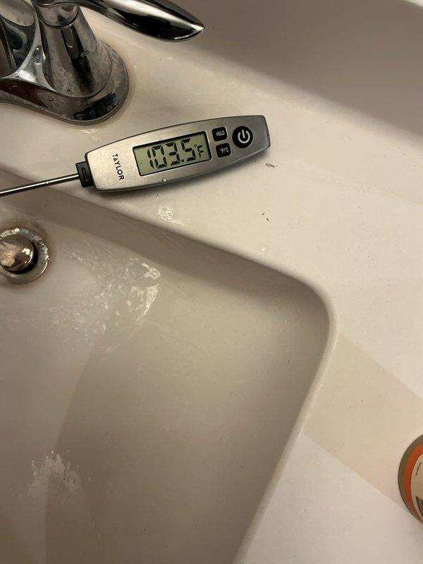 Responded to dispatch for inadequate hot water supply from a 10-year-old gas water heater. Customer reported hot water lasting only 7-8 minutes during showers. Upon arrival, conducted diagnostic testing and measured output water temperature at 102°F after 56 minutes of continuous operation, confirming insufficient heating capacity. Determined that the existing gas unit required replacement due to failed heating components and age-related deterioration. Removed old gas water heater and installed new Rheem residential tank water heater with proper venting, supply lines, and code-compliant connections including PEX supply piping and appropriate shut-off valves. Verified proper operation and tested output temperature at fixture, confirming 103.5°F delivery temperature. System restored to full operational capacity with adequate hot water recovery rate for household demand.