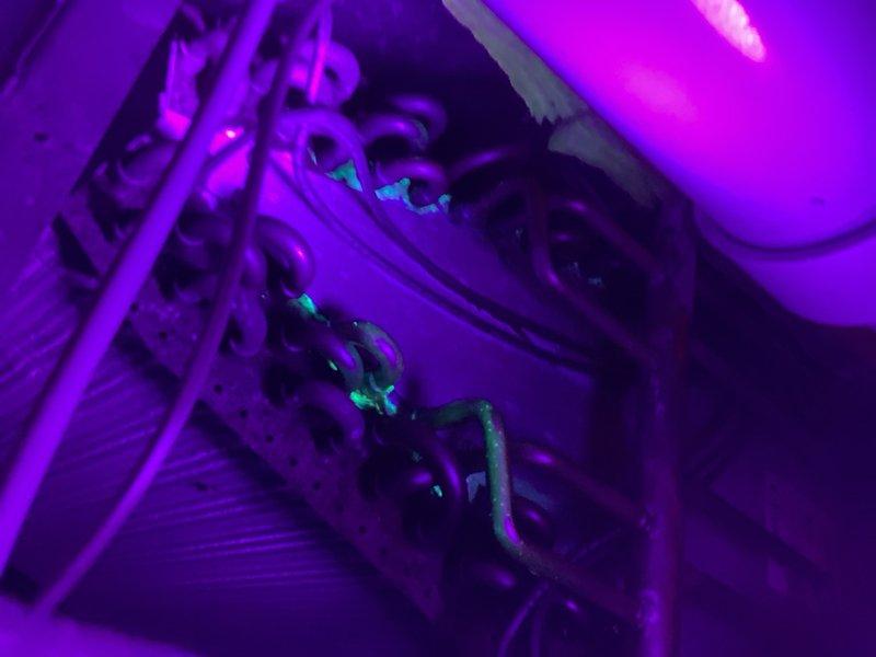 Responded to no-cool complaint on 10+ year old system. Investigated refrigerant leak using UV dye detection and confirmed leak location on evaporator coil using UV light inspection. Identified failed blower wheel with fins separated from center hub causing excessive vibration and unit shutdown. Submitted parts order for replacement blower wheel. Prepared estimate for evaporator coil replacement and scheduled Comfort Advisor appointment to review repair options with homeowner.