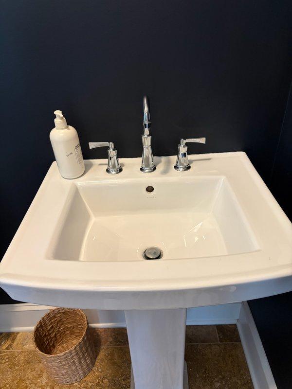 Successfully completed replacement of existing toilet with customer-supplied TOTO Drake model and installed new Brizo three-handle faucet assembly on powder room pedestal sink. Additionally installed Grundfos comfort valve as an add-on to existing recirculation system. All fixtures were customer-provided materials, and installations were performed on a time and materials basis. Verified proper operation of all new fixtures including water flow, drainage, and comfort valve functionality upon completion.