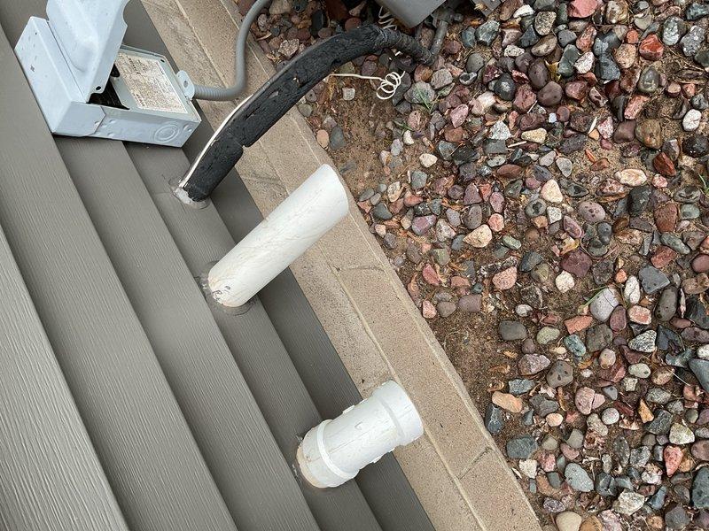 Performed preventive maintenance on a 2006 WeatherKing air conditioning system with matching furnace serving an R-22 refrigerant application. Installed new 16x20x1 air filter and cleaned condenser coil. System was operated for approximately 15 minutes and confirmed to be cooling properly with supply air temperature measured at 56°F and return air at 75°F, producing a 19°F temperature split within normal operating range.

During inspection, identified that the previously installed condenser fan motor is an aftermarket replacement that appears dimensionally incorrect for this unit. The motor body length causes the fan blade to sit too deep within the shroud, which may restrict condenser airflow and negatively impact head pressure and overall cooling performance. This condition requires verification and possible correction.

Outdoor service conditions were compromised by rain and significant ant infestation around the condenser unit, which limited safe access and required intermittent wor