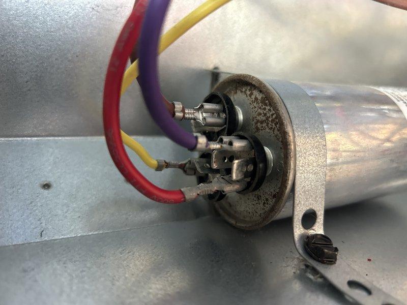 Performed comprehensive tune-up and inspection on residential A/C unit. Upon evaluation, identified that system is not cooling to full potential. Documented electrical connections including contactor assembly, capacitor terminals, and control wiring for future reference. Customer was notified of reduced cooling capacity and recommendations will follow for corrective measures to restore optimal system performance.