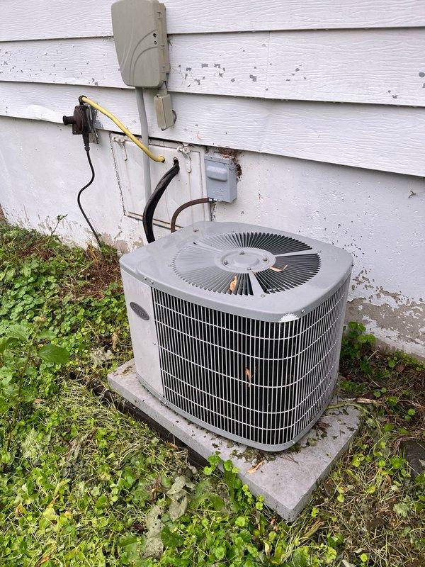 Responded to no cooling complaint on aging HVAC system. Upon arrival, found indoor furnace calling for cooling with blower operational, but outdoor condenser unit unresponsive. Diagnosed failed dual-run capacitor (30/5 MFD) reading zero on both terminals, preventing compressor and condenser fan operation. Additionally discovered severely restricted airflow due to dirty blower wheel, plugged secondary heat exchanger, and completely blocked evaporator coil. Replaced defective capacitor with new unit to restore immediate cooling functionality. Advised property owner that system requires comprehensive maintenance including coil cleaning and blower service, and recommended obtaining replacement system pricing given the advanced age of equipment and accumulating maintenance needs. System restored to operational status with cooling capability confirmed.