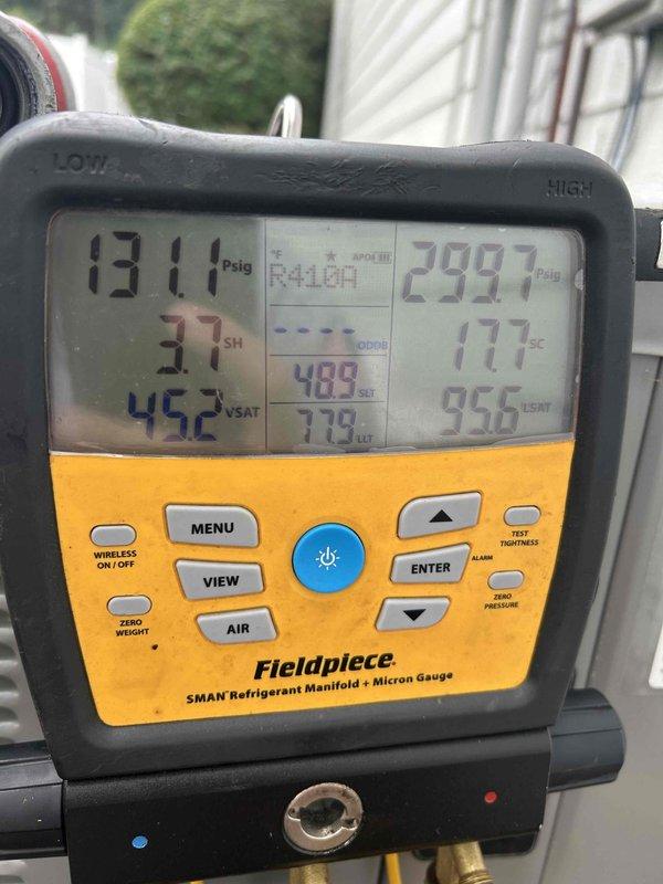 Performed comprehensive air conditioning tune-up on residential Ruud HVAC system with no reported issues. Cleaned outdoor condenser unit and indoor components, inspected all electrical connections and controls, and verified proper refrigerant pressures and temperatures using digital manifold gauges. System tested and confirmed cooling effectively with superheat reading of 33°F and subcooling of 17°F, indicating optimal refrigerant charge and airflow.