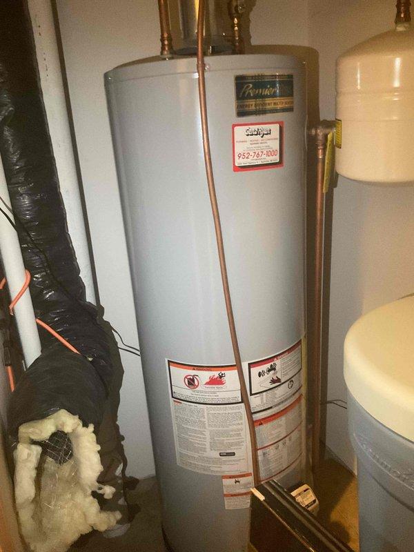 Responded to no cooling complaint on residential HVAC system over 10 years old. Upon arrival, found thermostat set to 86 degrees and confirmed inadequate cooling performance. Performed comprehensive system evaluation as a second opinion following previous minor repair by another service provider. Inspected furnace, air handler, condensate lines, refrigerant connections, and associated ductwork in mechanical closet. Observed moisture accumulation on supply ductwork indicating potential airflow or insulation concerns. Verified all electrical connections, gas lines, and copper refrigerant piping for proper installation and condition. Documented existing equipment configuration including furnace unit, water heater, expansion tank, and ventilation components. Based on age of system, declining performance, and previous repair history, recommended full system replacement as most cost-effective long-term solution. Provided detailed assessment and replacement options to homeowner for considerat