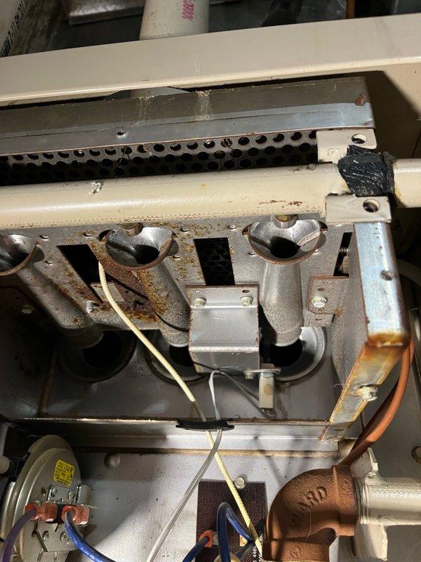 Replaced single-stage control board on heating system, which required custom wire splicing and installation of appropriate wire harnesses to complete the conversion. Original transformer stud was damaged during removal, necessitating use of a larger replacement transformer from stock to ensure proper operation. Installed new igniter assembly with harness as part of the control board kit, tested all system functions, and verified proper heating operation upon completion.