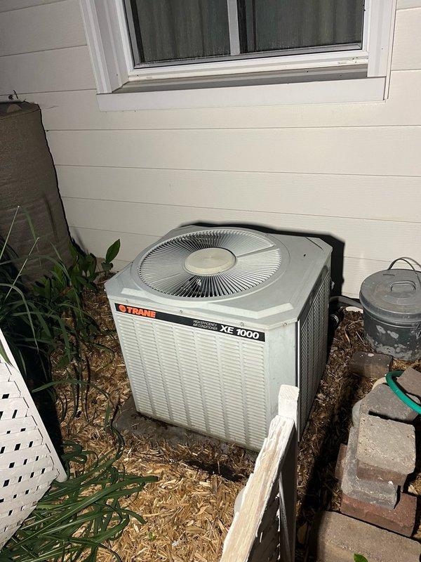 Responded to service call for AC unit not shutting off when commanded at thermostat. Upon arrival, tested system operation and found unit cycling properly with thermostat calls for cooling; intermittent issue could not be replicated during diagnostic testing. Inspected Trane XE 1000 condenser unit and indoor air handler components, noting severely deteriorated evaporator coil with heavy dirt accumulation, biological growth, and corrosion affecting heat exchanger surfaces. Advised customer that intermittent shutdown issue likely thermostat-related but cannot be confirmed without issue recurring. Provided estimate for thermostat replacement for future consideration. System operational at time of departure.