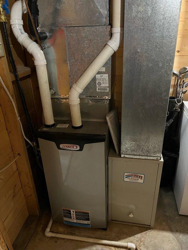 Responded to no cooling complaint on 7-year-old central air conditioning system. Upon arrival, found outdoor unit condenser fan motor running but compressor not engaging. Diagnosed failed dual run capacitor with hermetic terminal reading approximately 4µF on 30/5µF rated capacitor. Replaced defective capacitor with new 30/5µF unit and restored compressor operation. Performed complete annual preventative maintenance tune-up inspection including refrigerant charge verification, electrical connections, airflow measurements, and system performance testing. Confirmed proper system operation with temperature split exceeding 15 degrees across evaporator coil. Allowed system to run for 15 minutes to verify stable operation under load. All other components tested within manufacturer specifications. System restored to full cooling capacity.