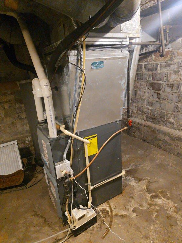 Responded to no cool complaint on 10-year-old system experiencing short cycling at condenser. Upon arrival, system was operating but outdoor unit was severely plugged with debris, causing unit to overheat and shut down on high-temperature days. Verified all electrical components, capacitors, and compressor diagnostics were within normal operating specifications. Performed complete tune-up service including thorough cleaning of condenser coil to remove accumulated debris and restore proper airflow. Explained to customer that inadequate airflow from dirty coil was causing thermal overload protection to trip during peak cooling demand. System tested successfully after service with proper temperatures and run times. Discussed benefits of regular preventative maintenance program to prevent future occurrences. Unit restored to proper cooling operation.